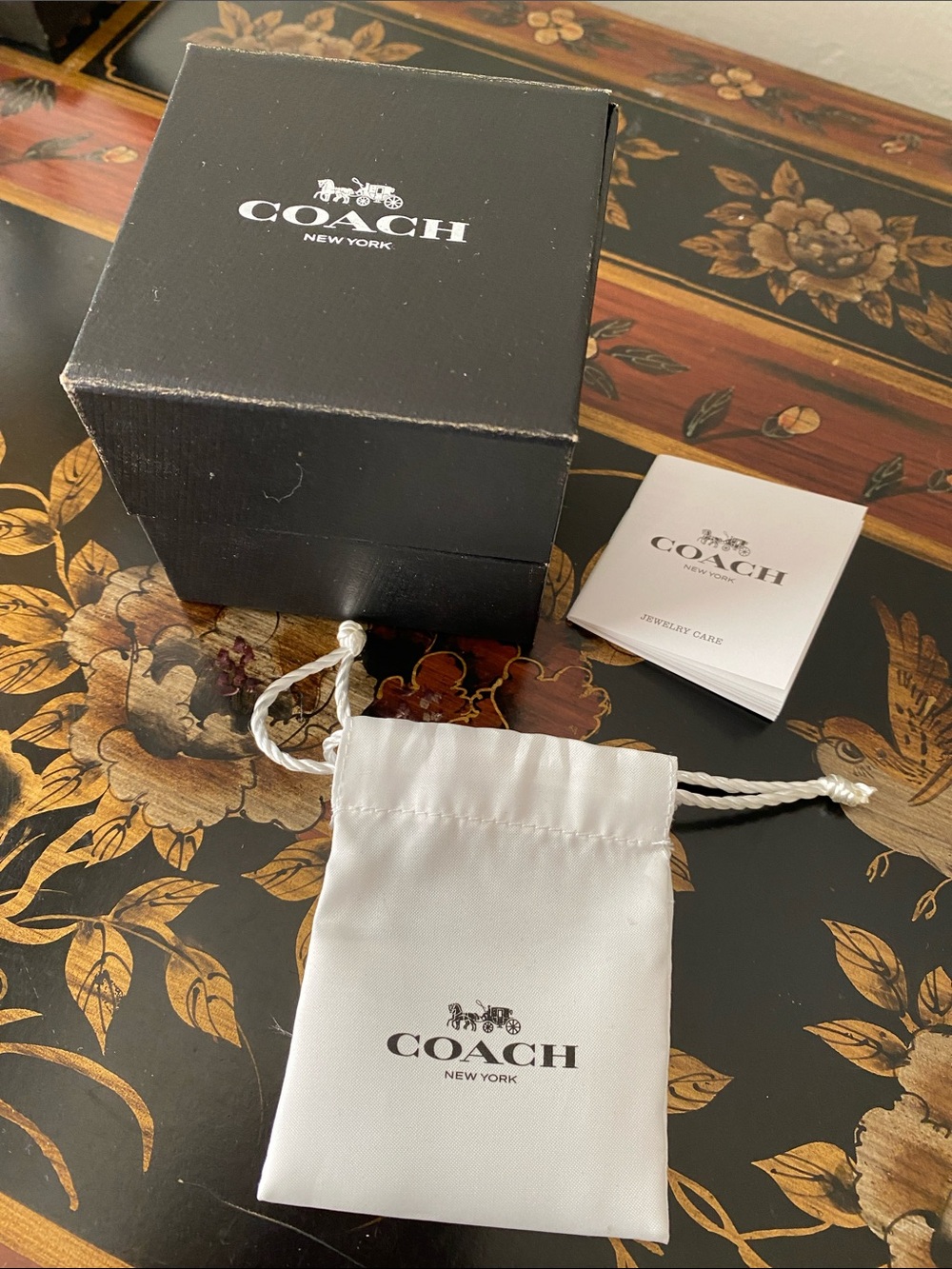 Coach gift box, jewelry pouch, booklet